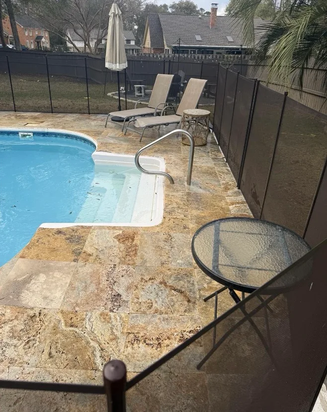 After: pool deck cleaning on travertine pavers
